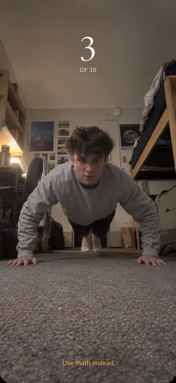 Flamonk push-up reset: the front camera counts, 3 of 10, with the option to use math instead